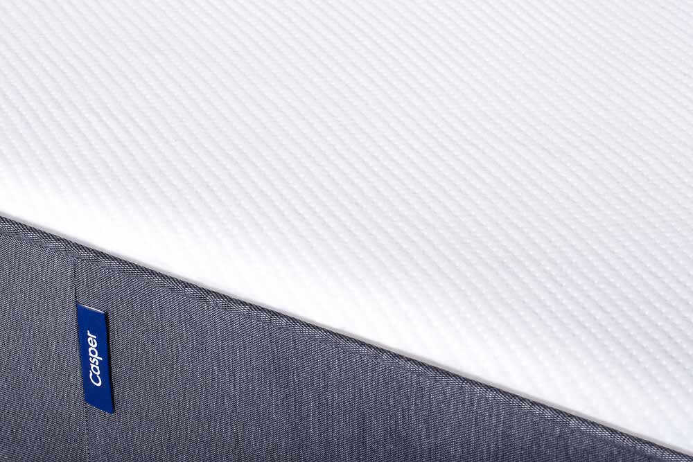 Image of the Casper logo on the front cover of the Casper mattress.