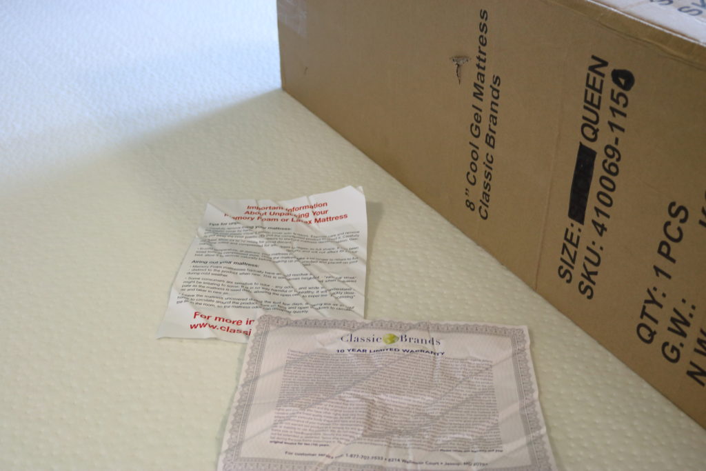 A Classic Brands 8 Inch Cool Gel mattress, delivery box, and in-box paperwork