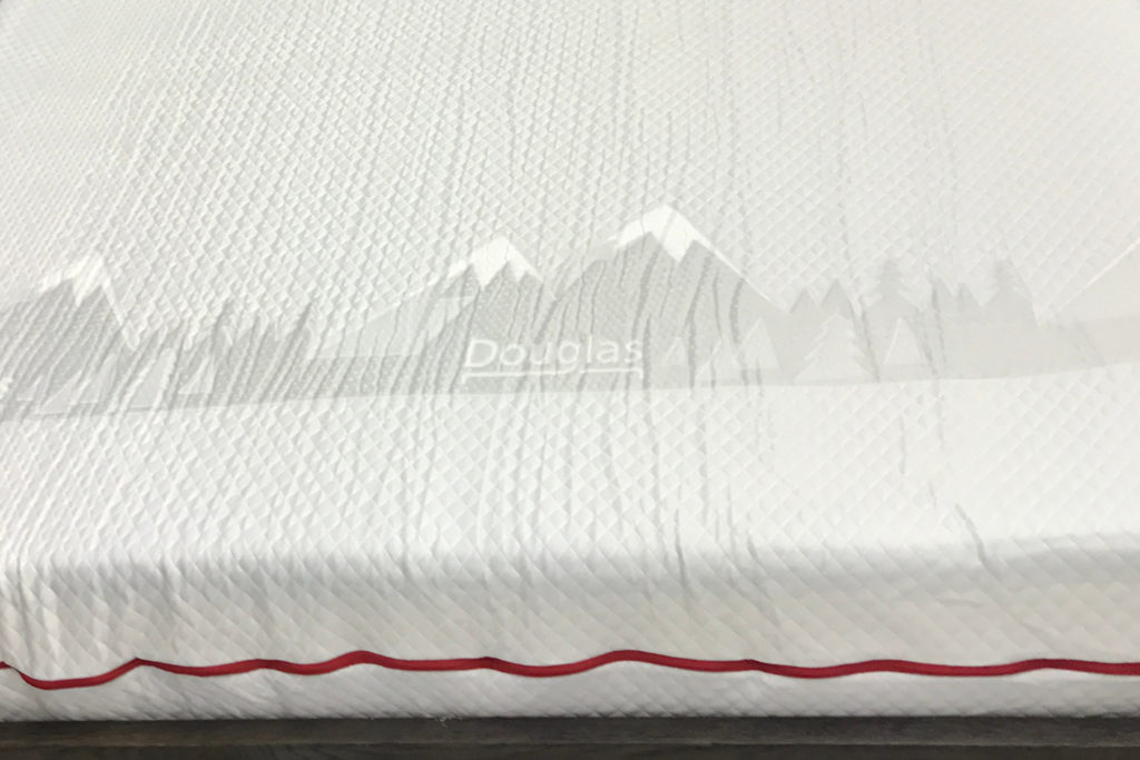 The Douglas mattress unwrapped and expanding