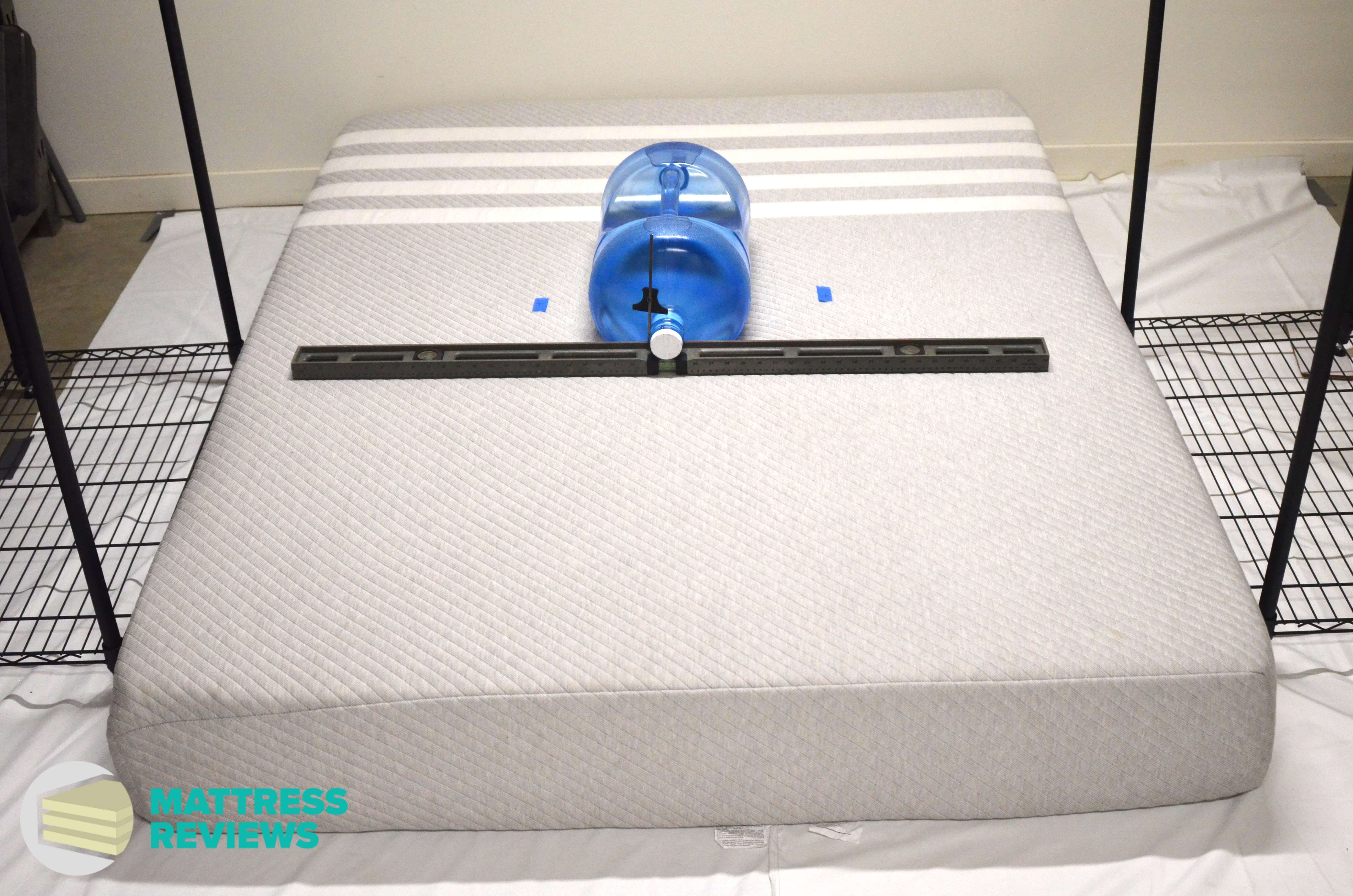 Image of the Leesa mattress firmness test.