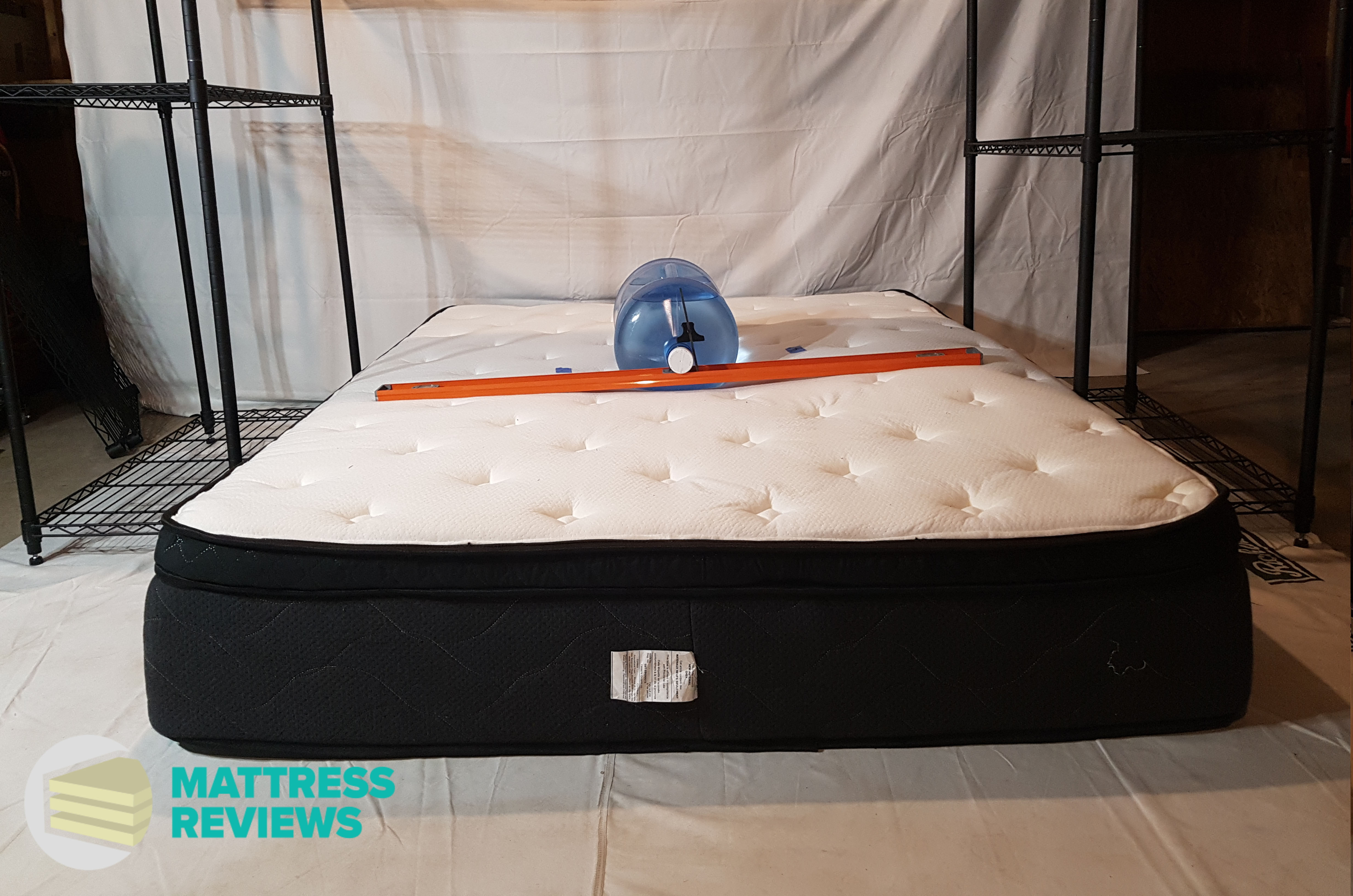 Image of the Hamuq mattress firmness test.