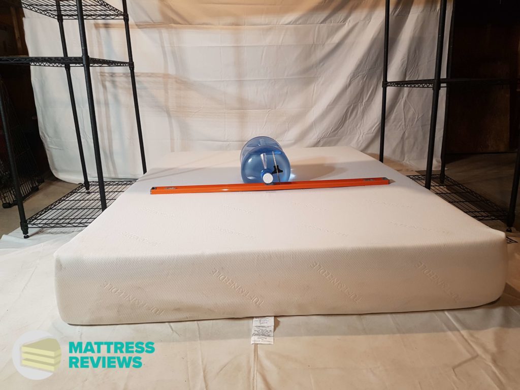 Image of the Tuft & Needle mattress firmness test.