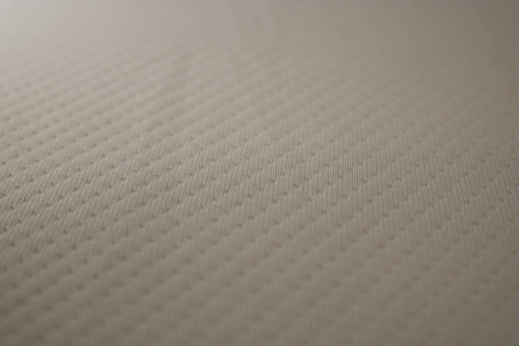 Image of the Tuft & Needle mattress cover.