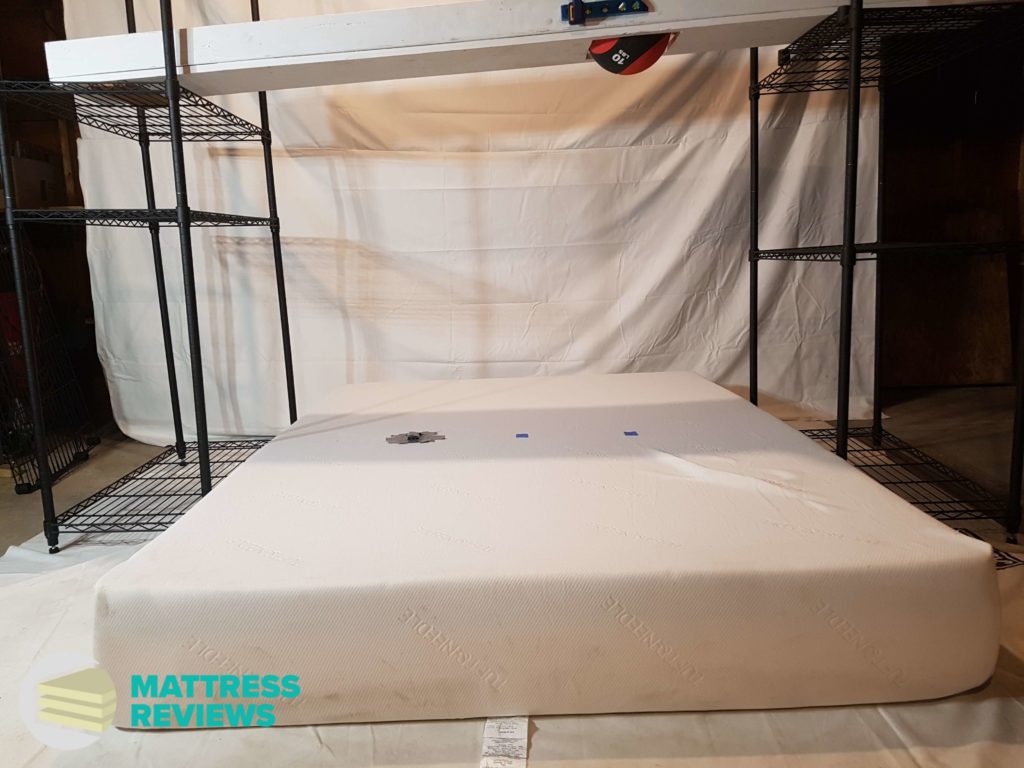 Image of the Tuft & Needle mattress motion isolation test.