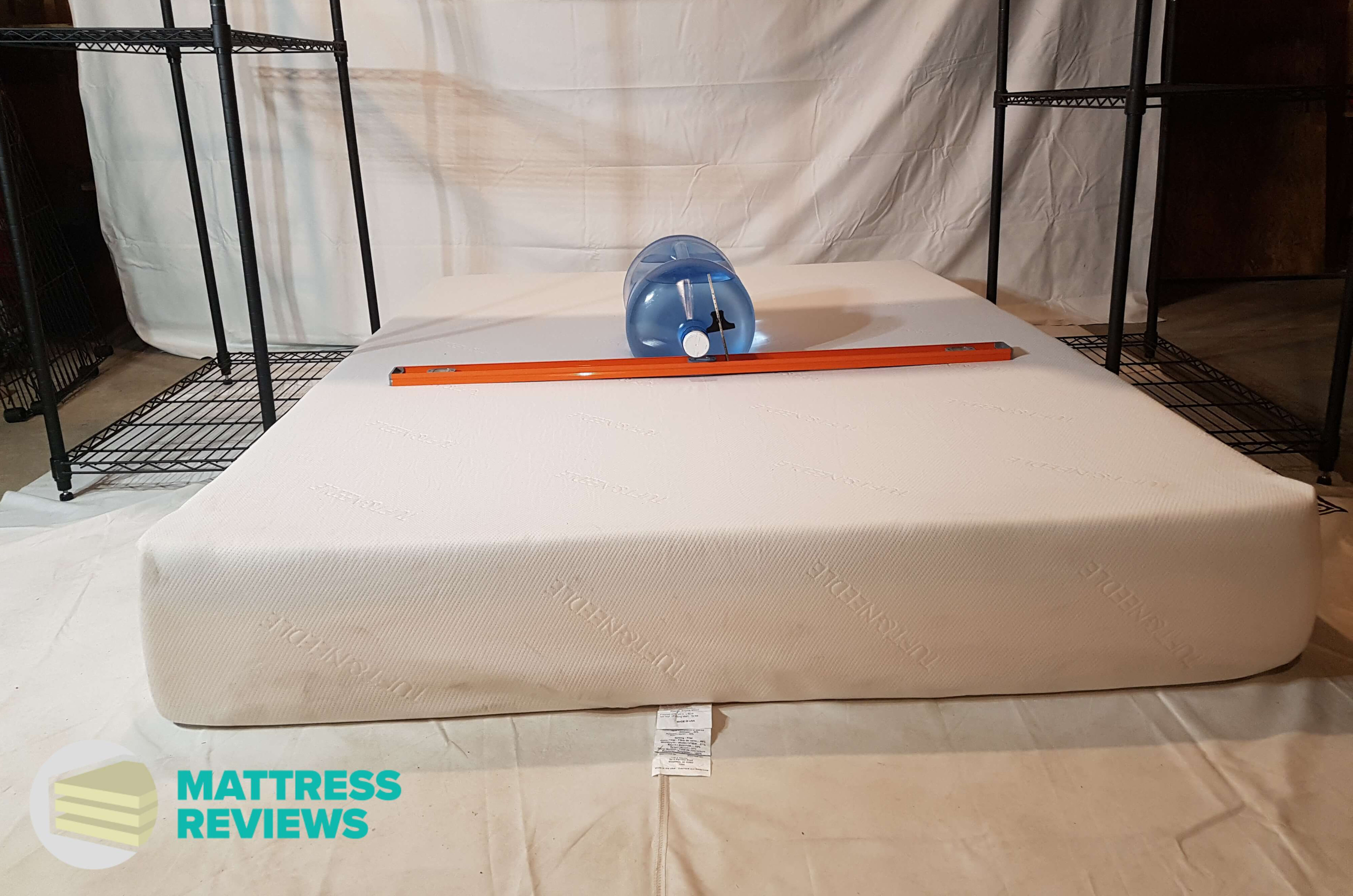 Image of the Tuft & Needle mattress firmness test.