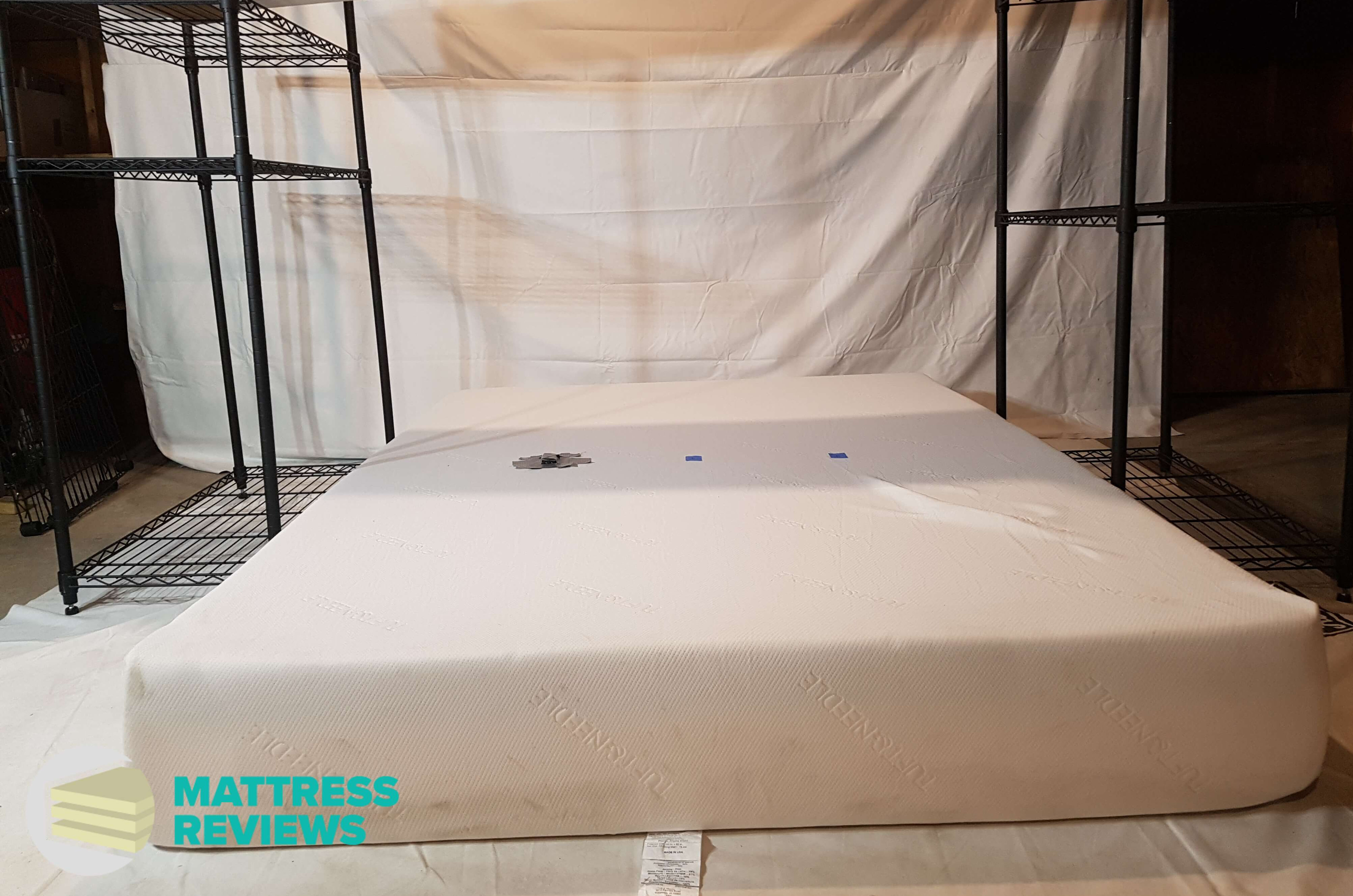 Image of the Tuft & Needle mattress motion isolation test.