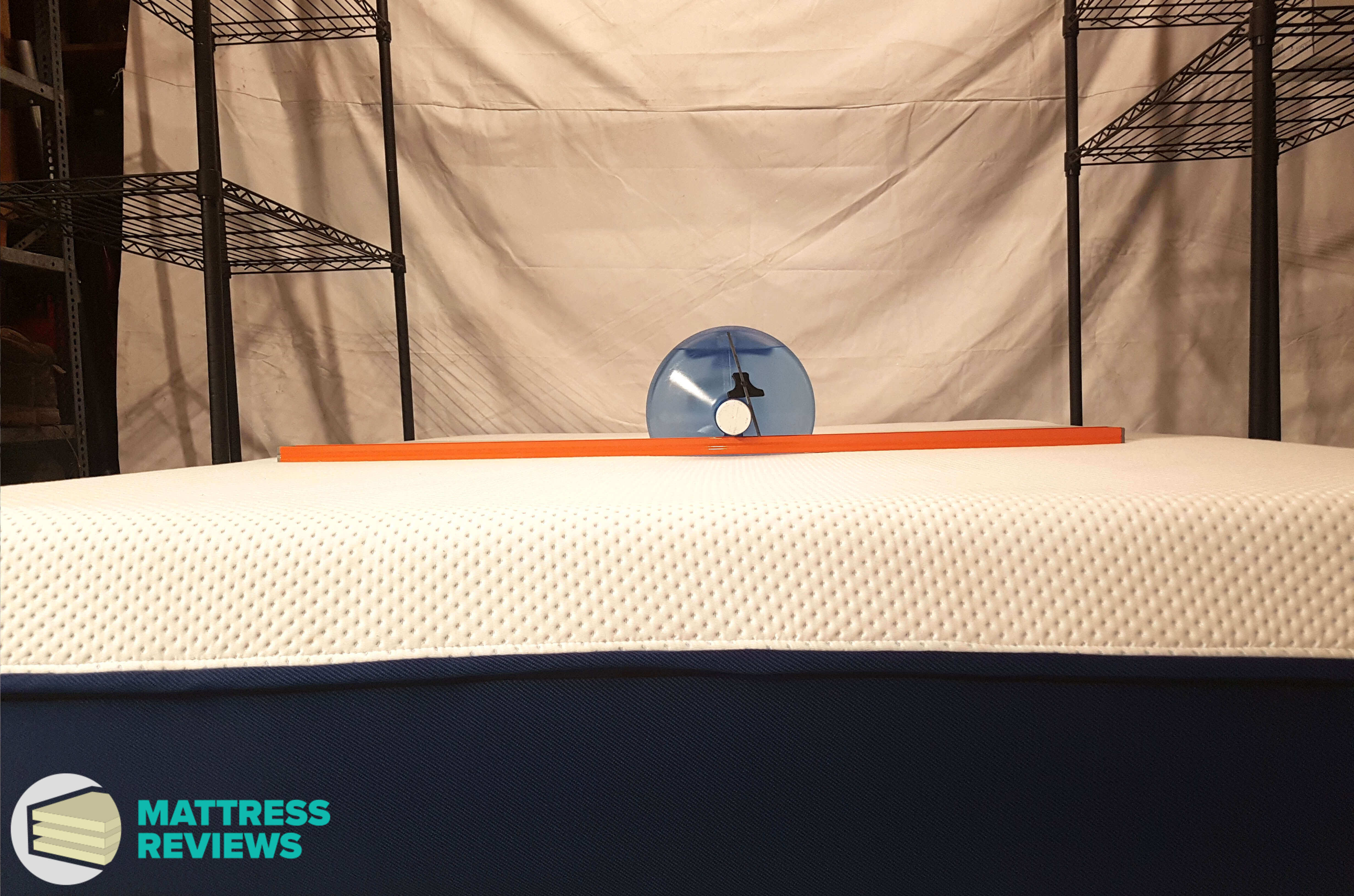 Image of the Amerisleep mattress firmness test.