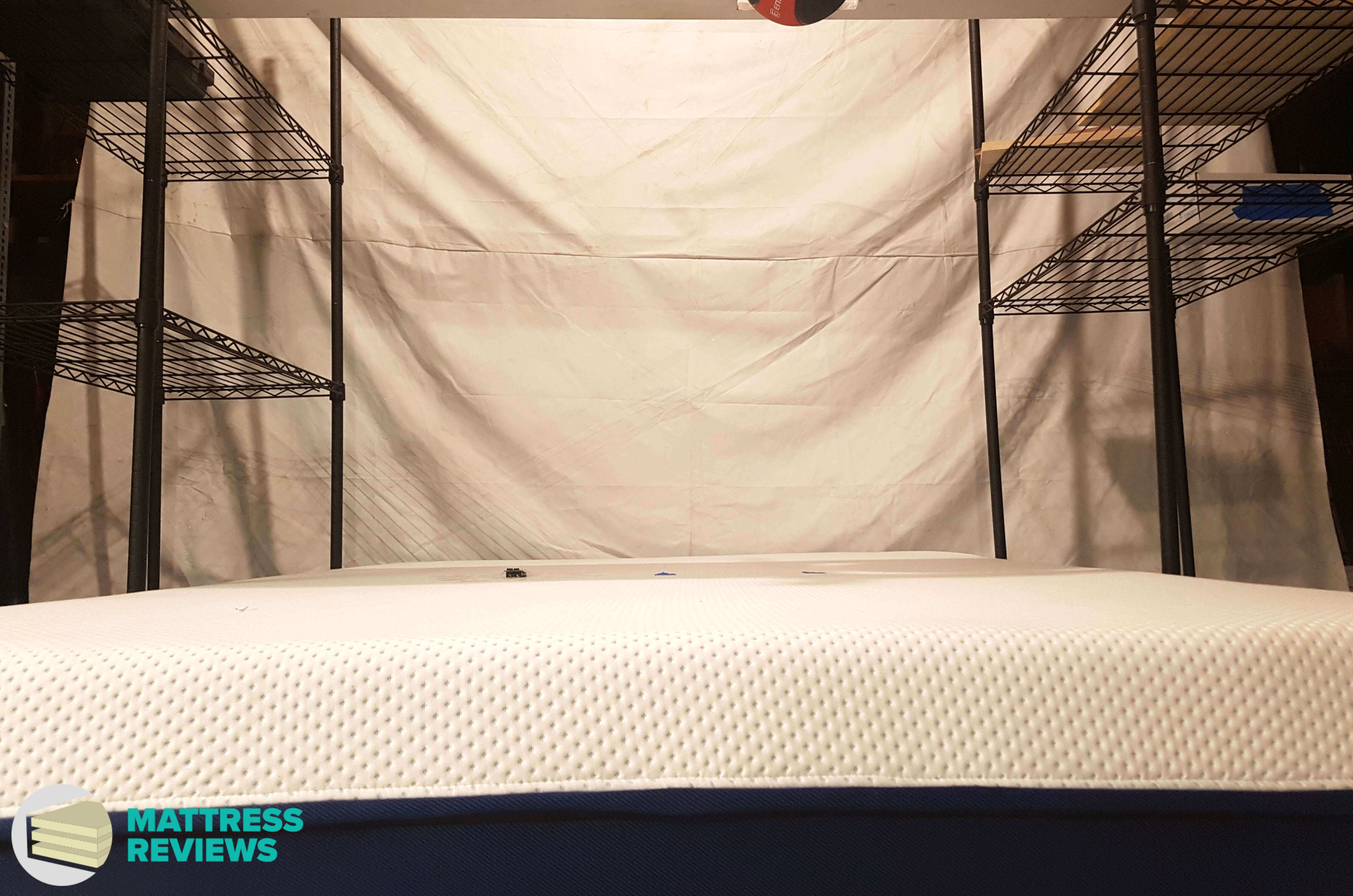 Image of the Amerisleep mattress motion isolation test.