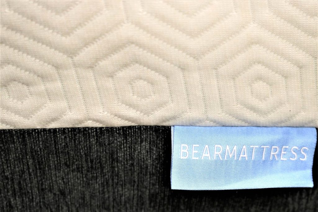 Image of the Bear logo on the front cover of the mattress.