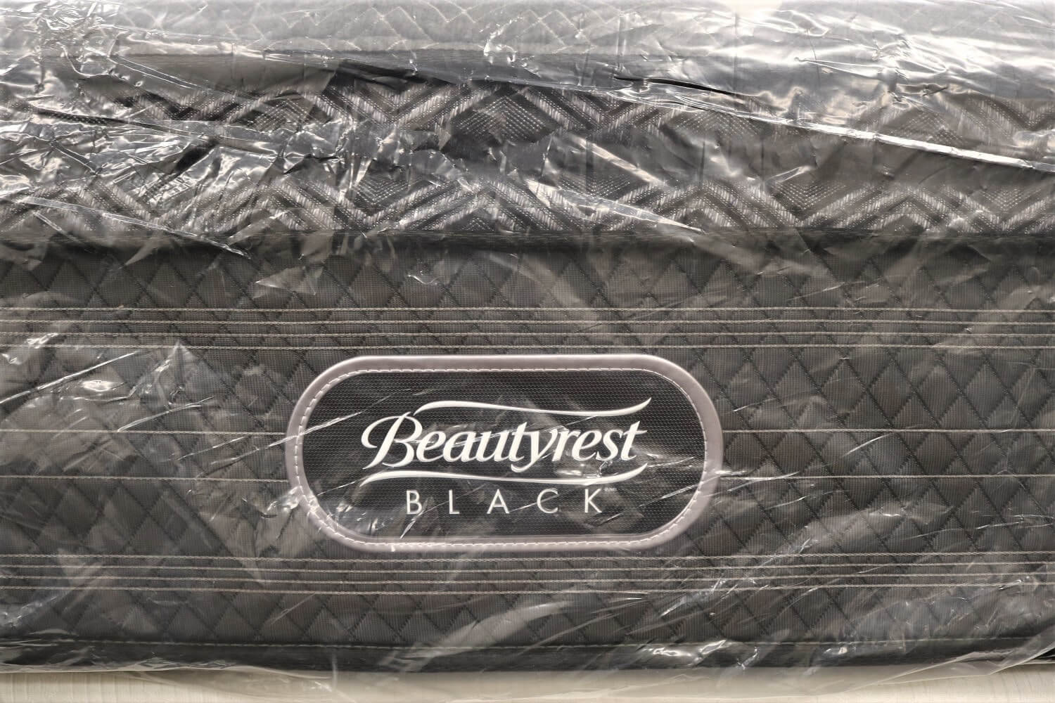 Image of the Beautyrest Black Devotion mattress in plastic wrapping.