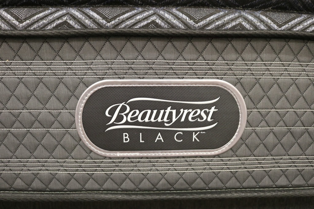 Image of the Beautyrest Black logo on the front cover of the Devotion mattress.