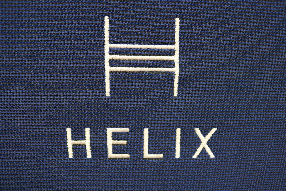 Image of the Helix mattress tag on the front cover.