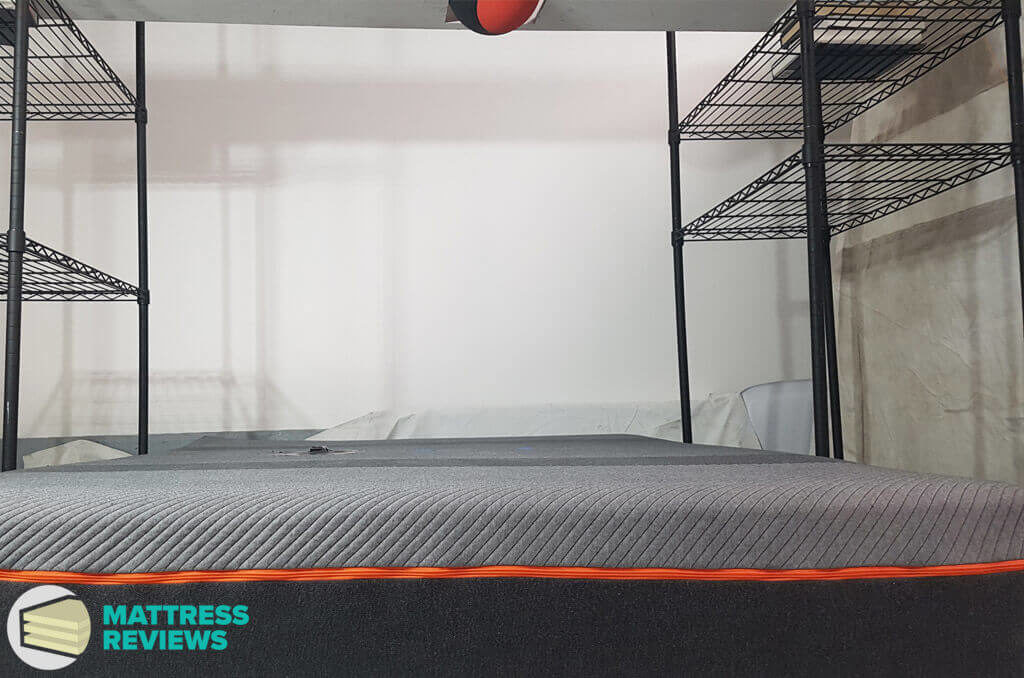 Image of the Recore mattress motion isolation test.