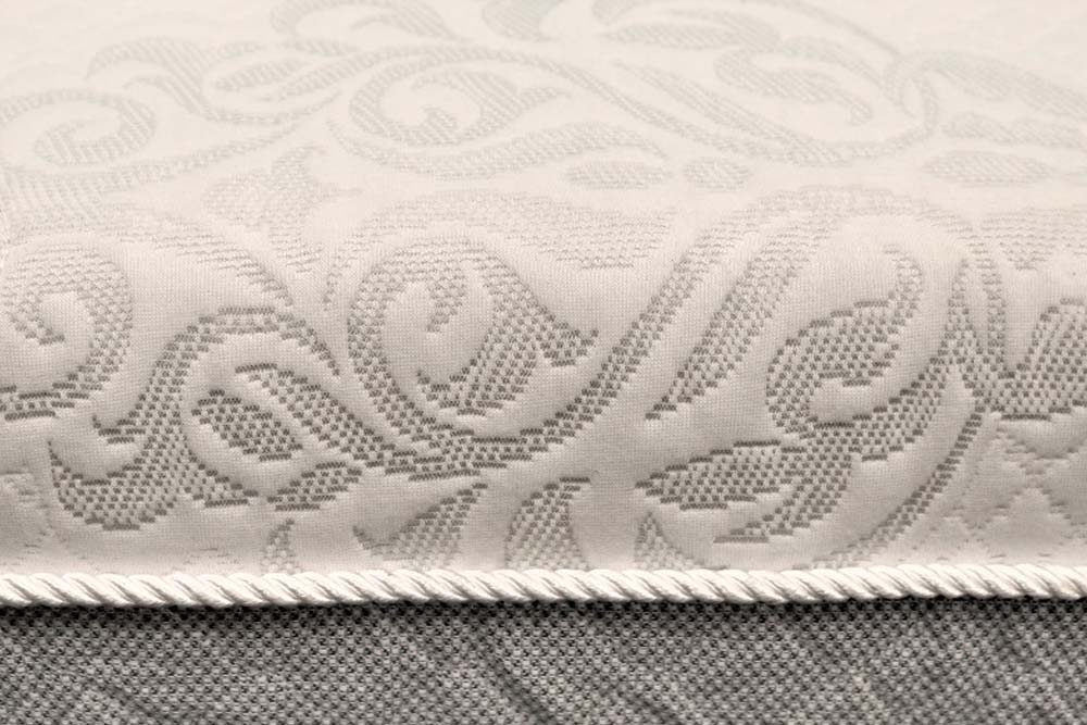 Image of the side wall and fabric piping details of the Novaform Costco mattress.