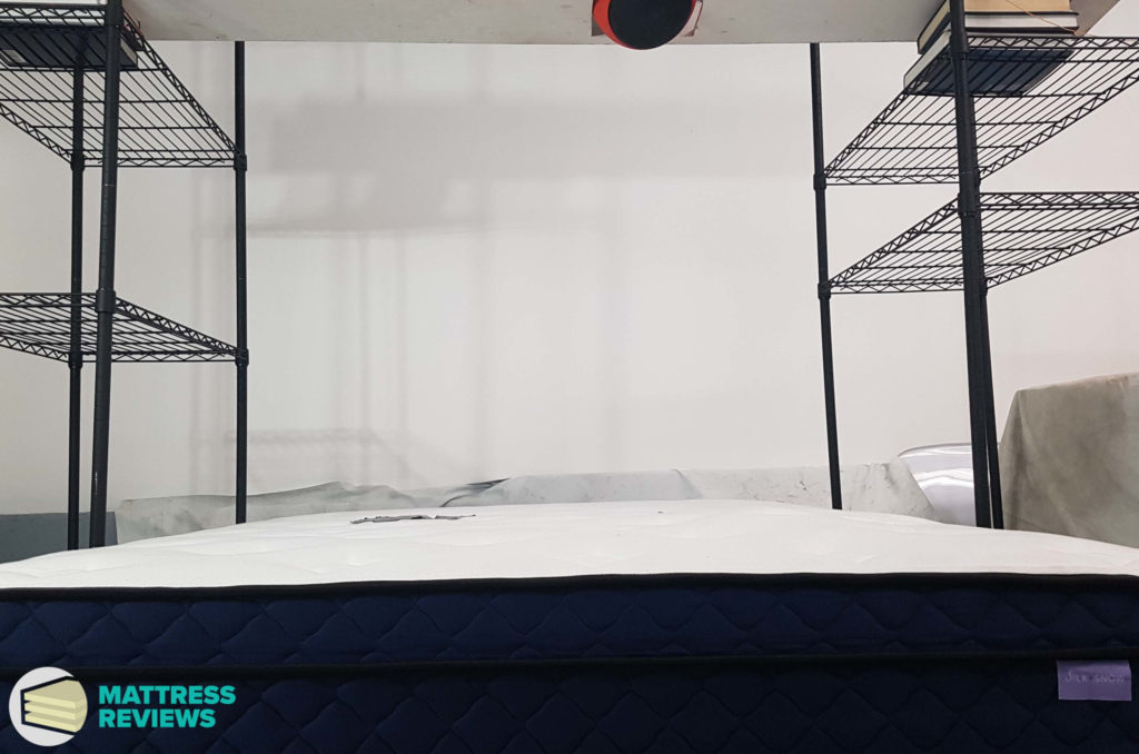 Image of the Silk and Snow Hybrid mattress motion isolation test.