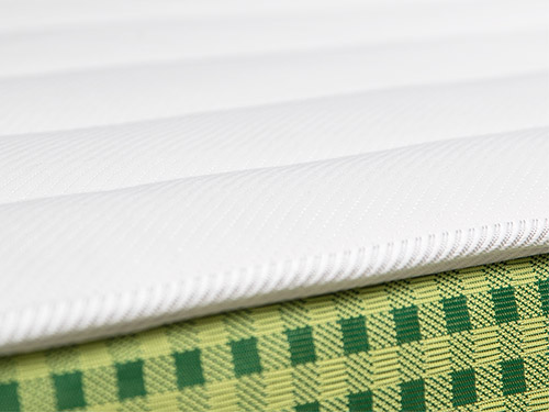 Close up image of the Brunswick mattress cover fabric.