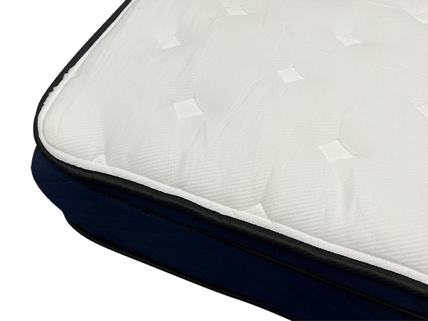 Image of the Silk and Snow Hybrid mattress out of its box.