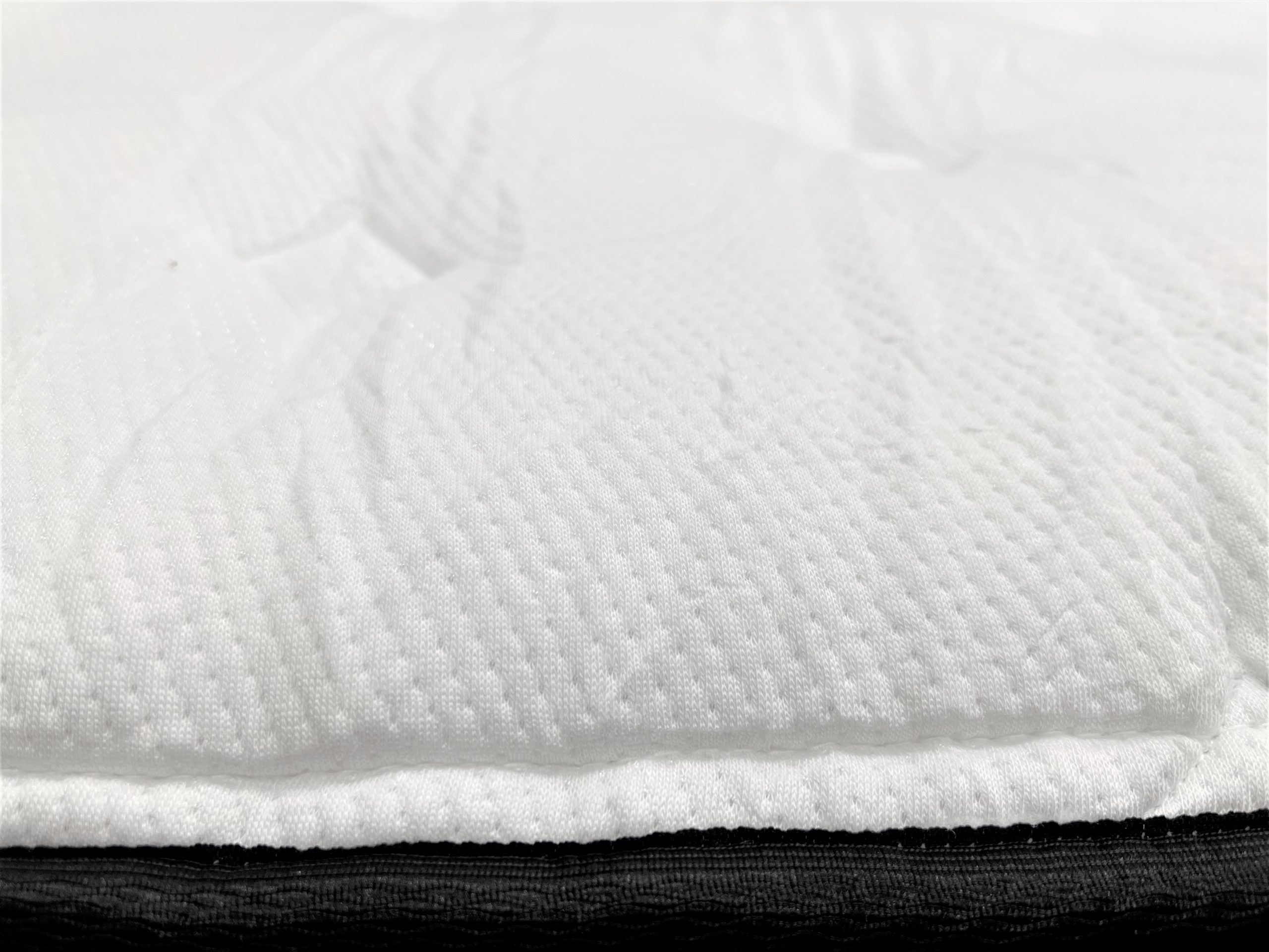 Image of the Silk and Snow Hybrid mattress cover fabric.