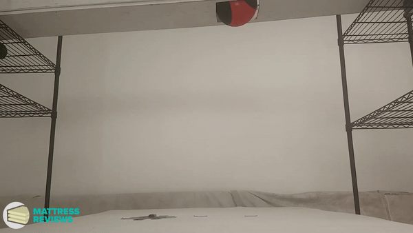 Looping video of the PerfectSense mattress motion isolation test.