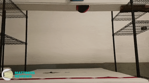 Looping video of the Juno mattress motion isolation test.