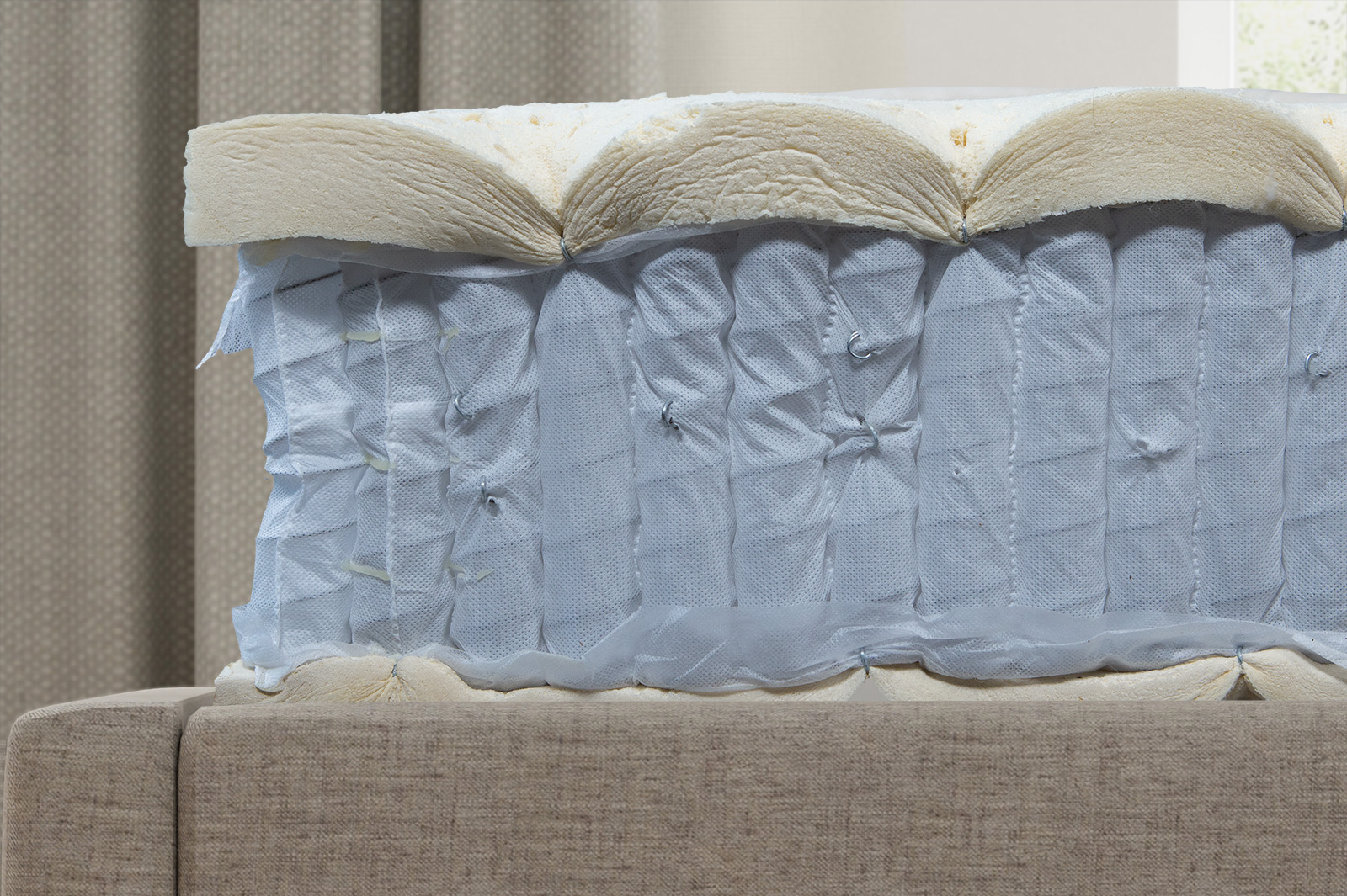 AvocadoGreenInternalsSide MattressReviewscom Side view of the Avocado Green mattress's internal layers