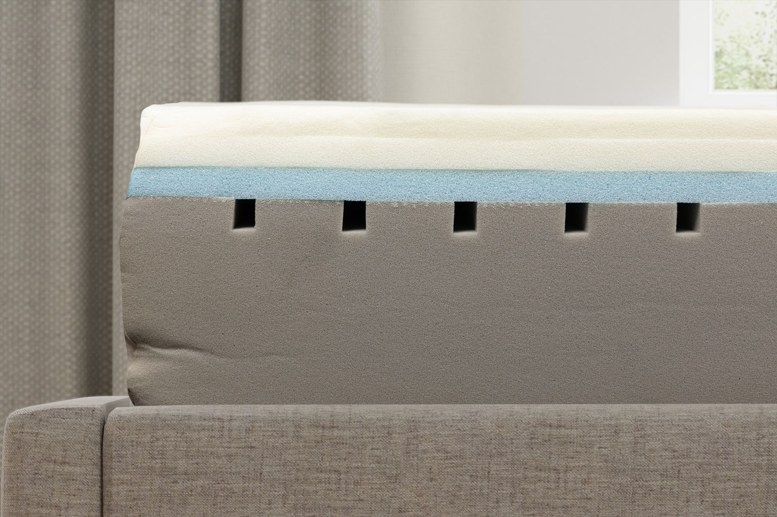 BloomCloudInternalsSide MattressReviewscom A photo taken from a side angle of the internal layers of the Bloom Cloud mattress