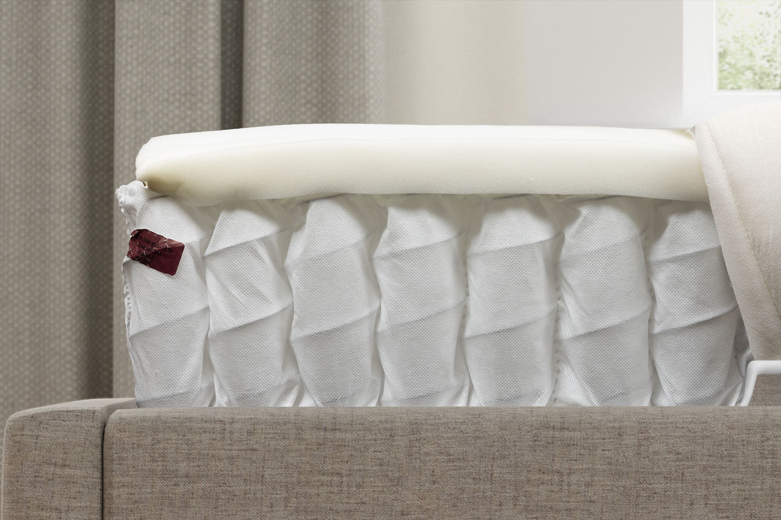 IkeaValevagInternalsSidemin MattressReviewscom Side angle photo showing the internal layers of the Ikea Valevag mattress