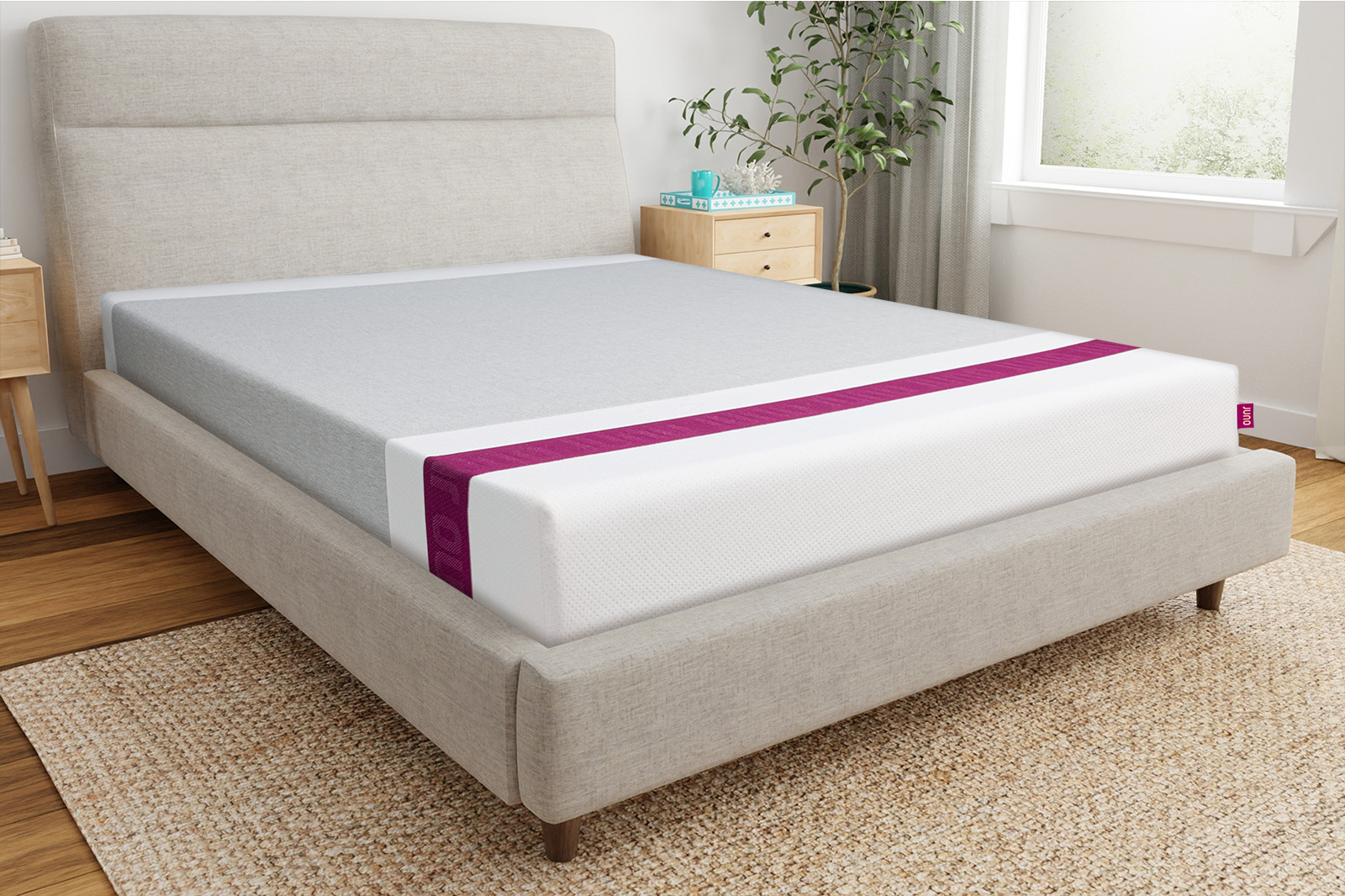 JunoCornerAngle MattressReviewscom Front corner angle photo of a Juno mattress sitting on a bedframe in a bedroom
