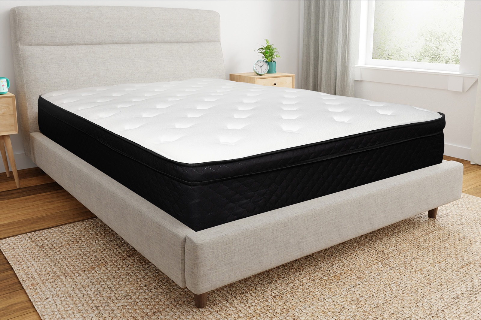 Corner view of thehamuq original hybrid mattress on a bedframe in a bedroom