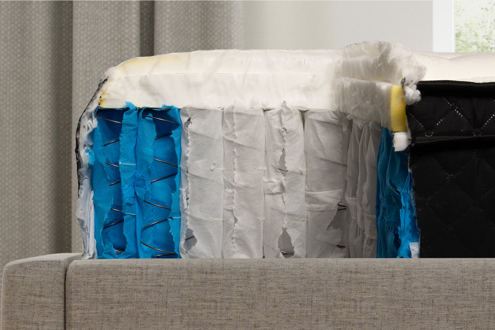 Side view of the hamuq original hybrid mattress internal layers