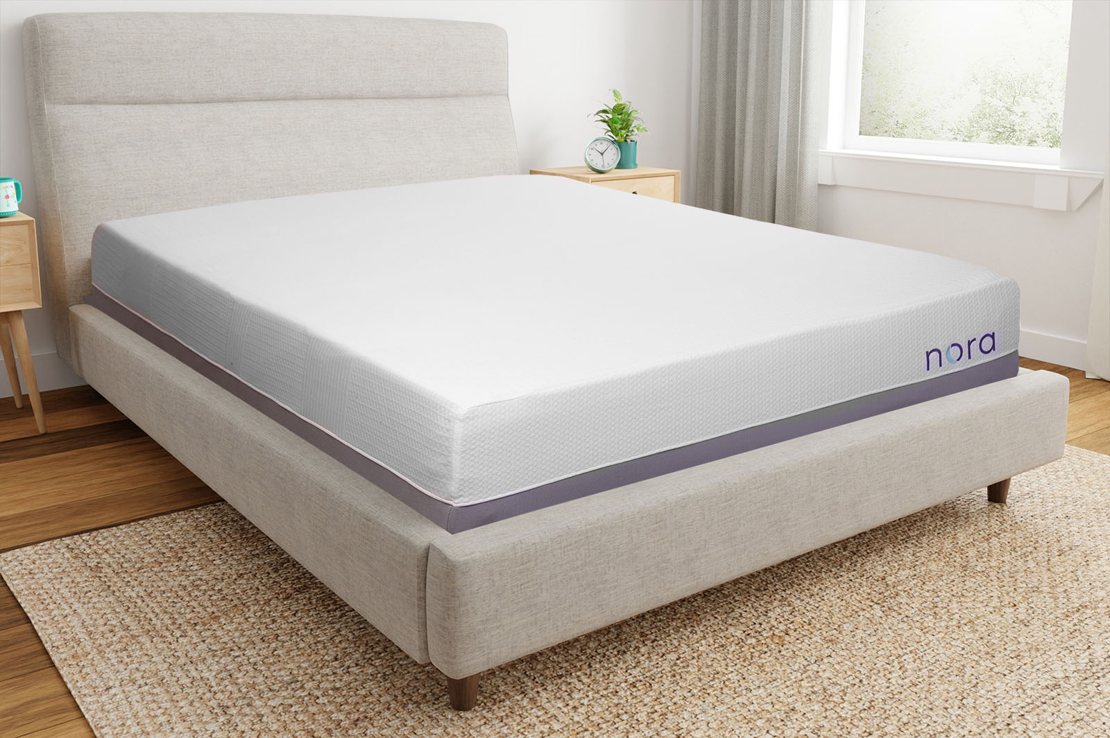 Corner view of the Nora mattress on a bed
