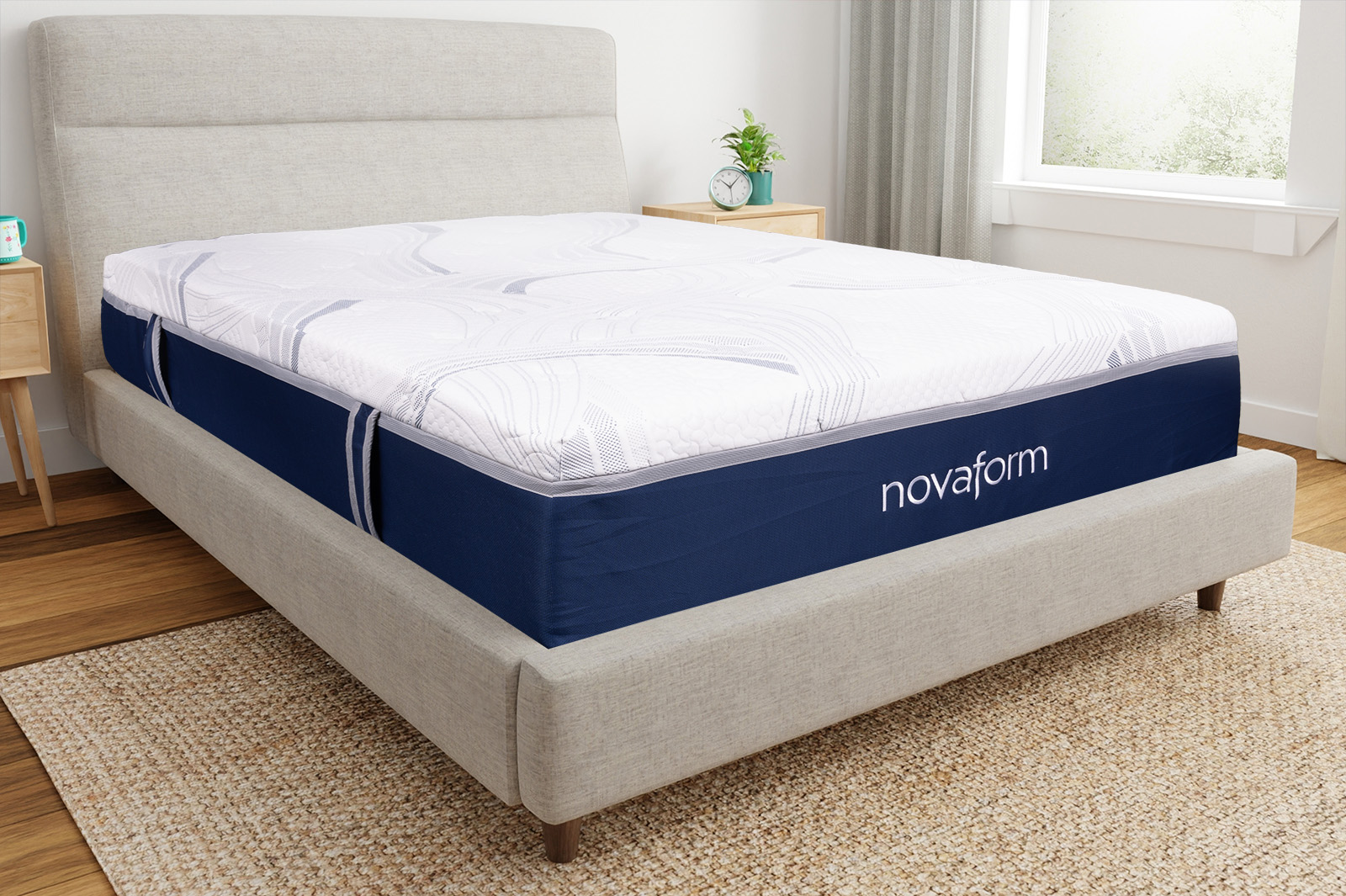 Corner view of the nova comfort grande plus mattress on a bedframe in a bedroom