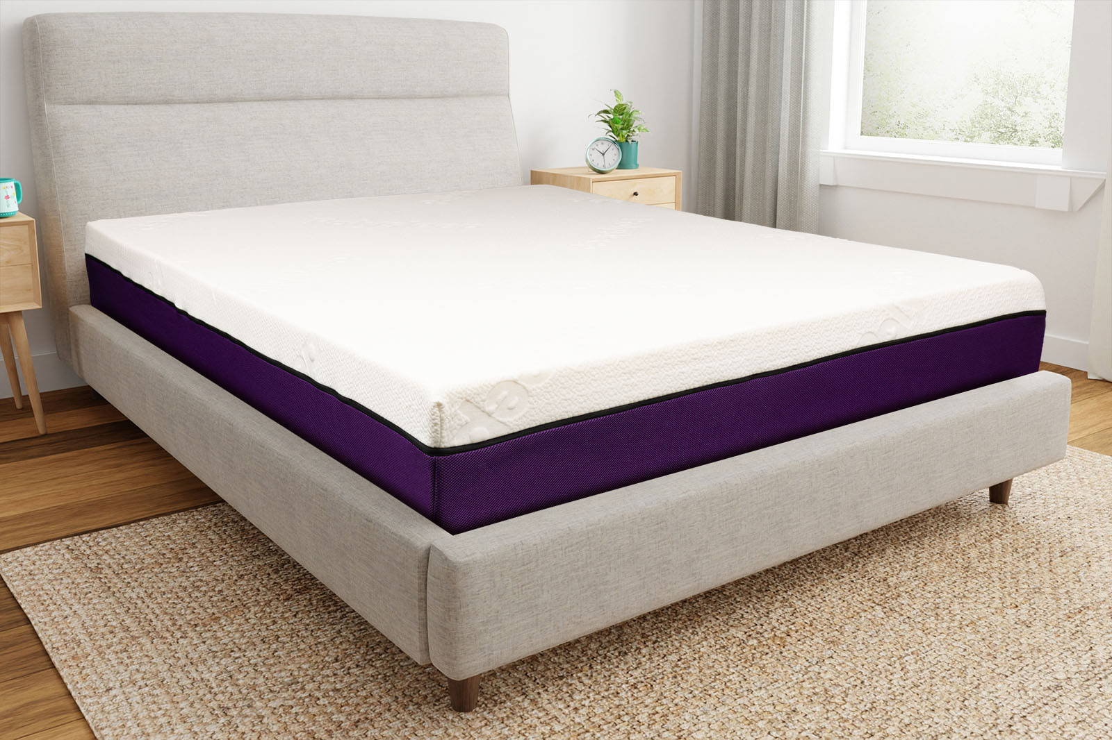 PolysleepTheCornerAngle MattressReviewscom Corner view of the The Polysleep mattress sitting on a bedframe in a bedroom