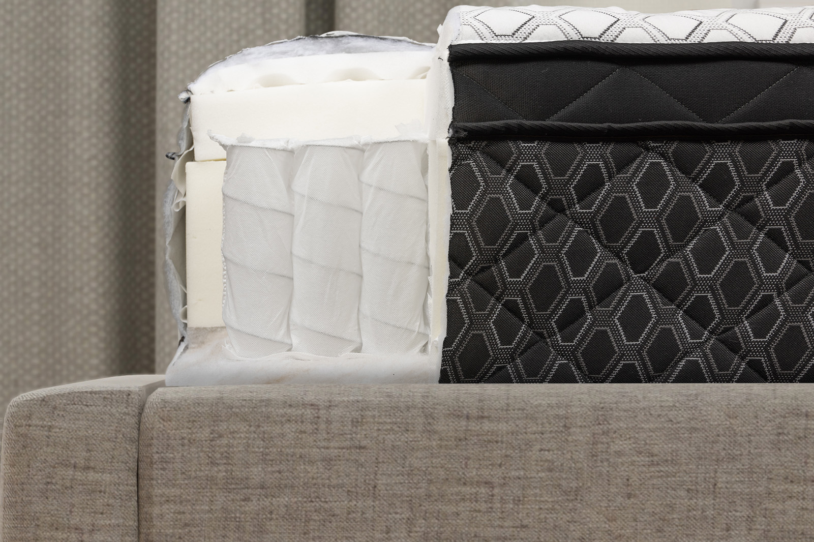 SealyPosturepedicHollycourtInternalsSide MattressReviewscom close up side view of the internal layers of the Sealy Posturepedic Hollycourt mattress