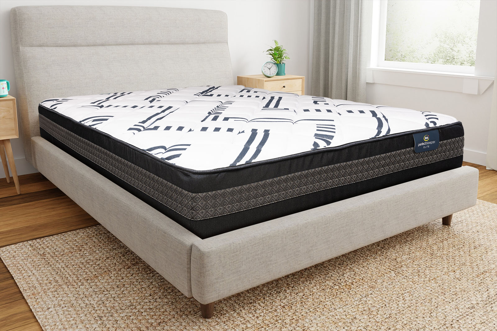 Corner view of the Perfect Sleeper Elite Percevall mattress on a bed
