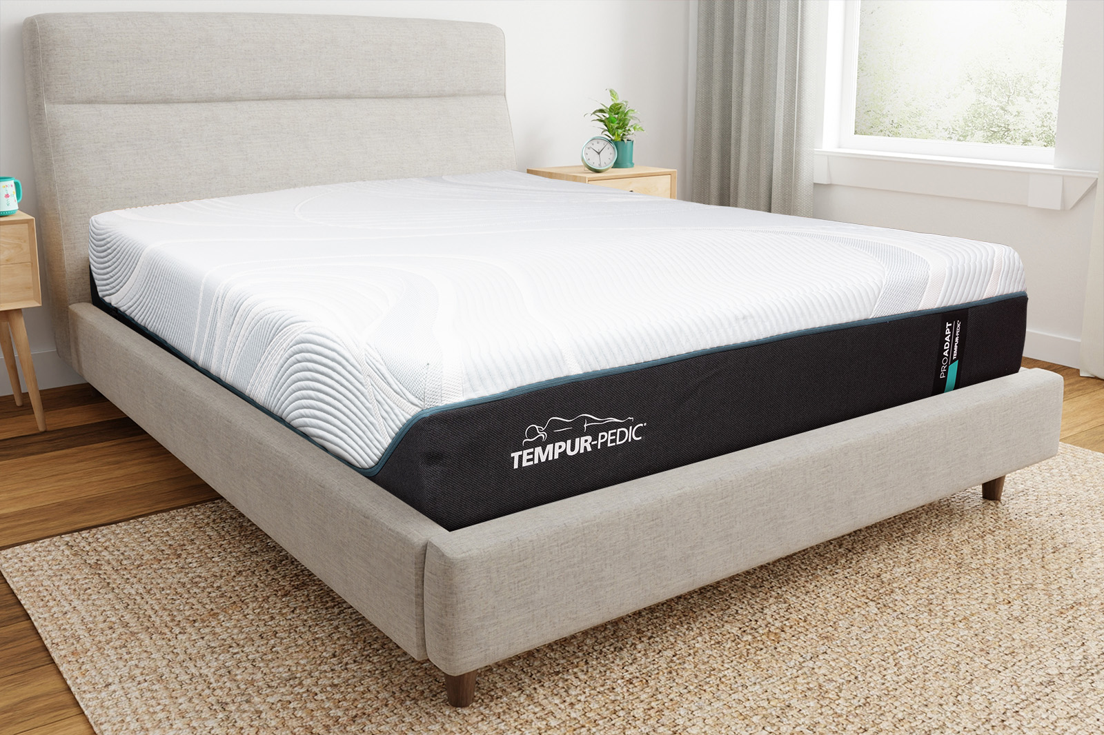 Corner angle photo of a Tempur Pedic ProAdapt Teal mattress on a bedframe
