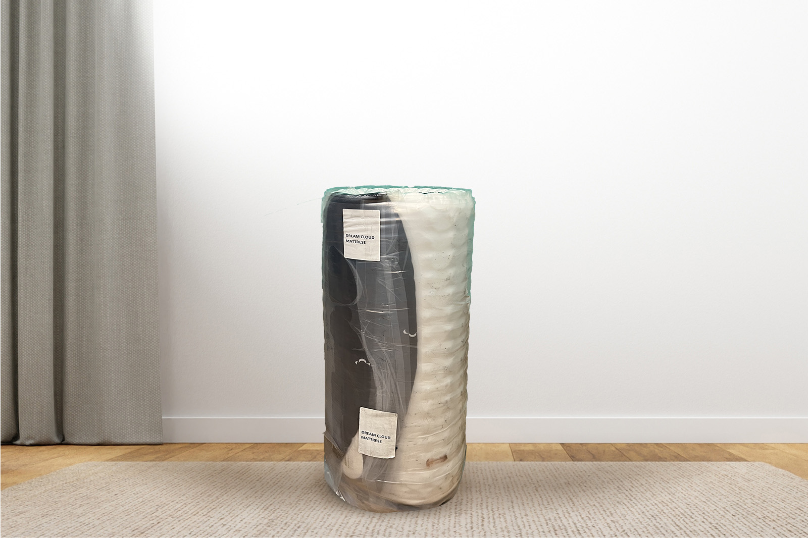 TheDreamCloudBox MattressReviewscom Photo of the dream cloud mattress standing upright in a room wrapped in plastic wrapping