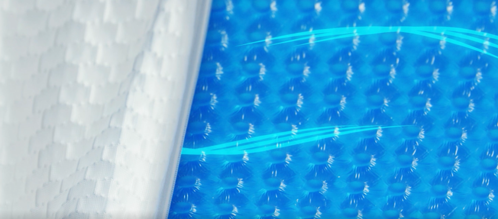 Blue cooling lines drift across the blue gel pad of a cooling gel memory foam pillow